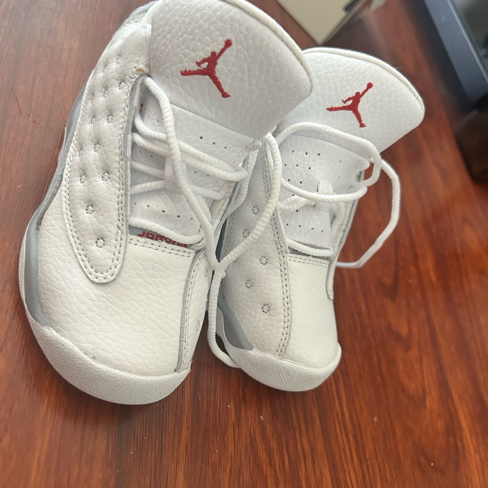 Jordan 13. 9c. White , red and gray.